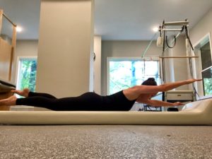 swimming pose pilates